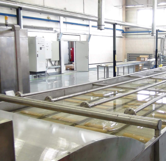 Cartridging lines of emulsion explosives